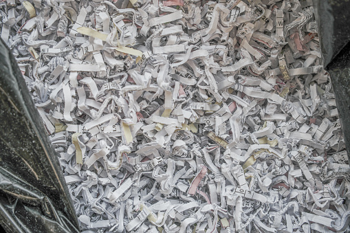 Pile of shredded secret paper documents to
