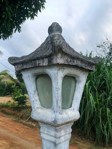 Classic design of an old street lamp in the village