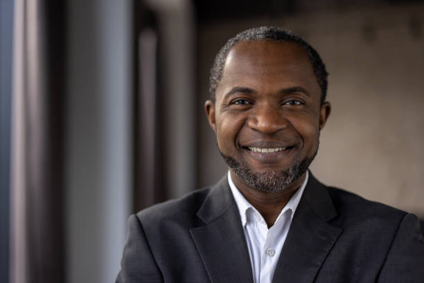 istock Confident african american businessman smiling in office environment 2148463531