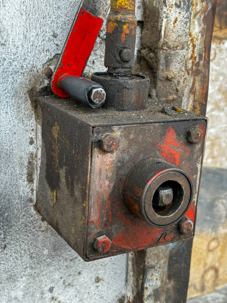istock A rusty red box with a red handle of a door shutter on top of it 2148465260
