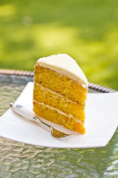 istock Vanilla cake with cream cheese cream on a white plate. 2148467782