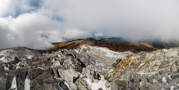 Kepler Track Panorama: Snow-Capped Mount Luxmore Landscape with Tussock-Covered Peaks in Fiordland National Park, New Zealand