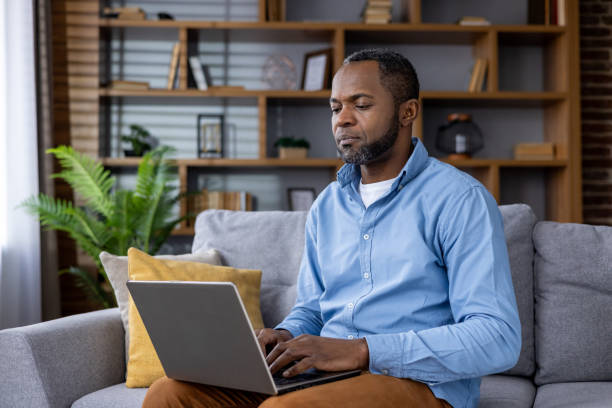 istock Professional man working from home on his laptop 2148468558