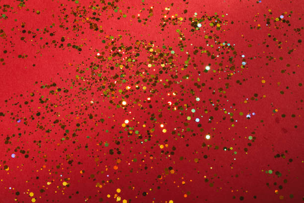 istock Red background with golden glitter spread - shiny holiday background texture 2148470153
