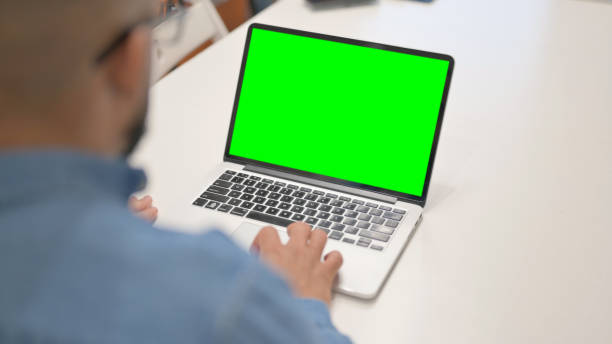 istock African Man Working on Laptop with Green Screen 2148470515