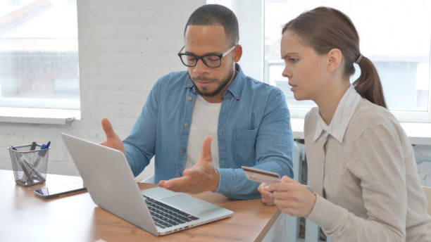 istock Business People Upset with Online Payment Failure in Office 2148472447