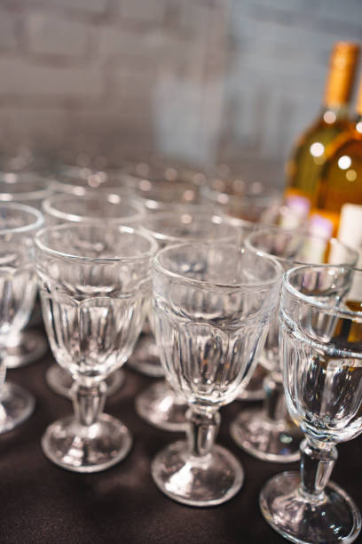 istock Empty thick glass wine glasses on banquet table. 2148474068