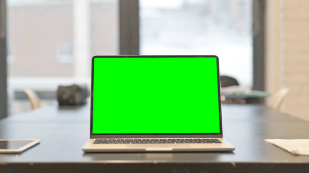 istock Laptop with Green Screen in Office 2148476413