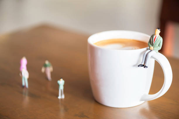 istock Business Miniature group businessman and coffee 2148477307