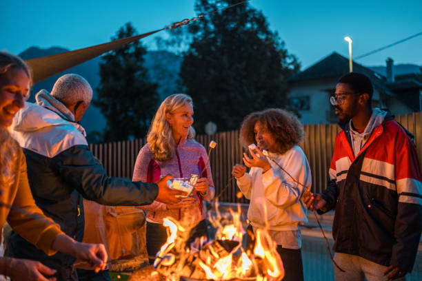 istock Multigenerational Family Enjoying Outdoor Marshmallow Roast 2148478608