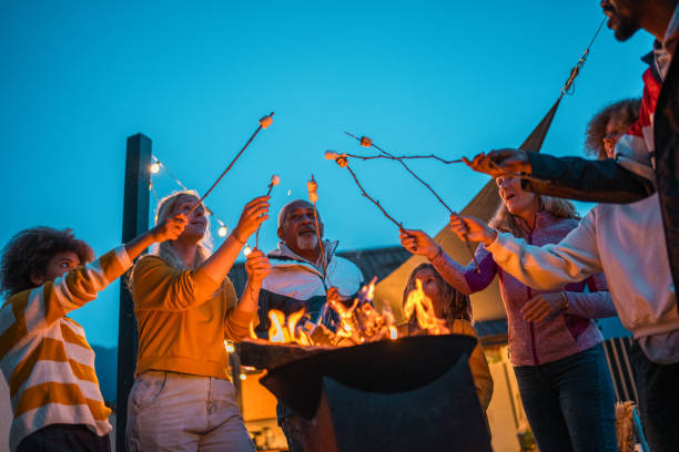 istock Multigenerational Family Roasting Marshmallows Together 2148478609