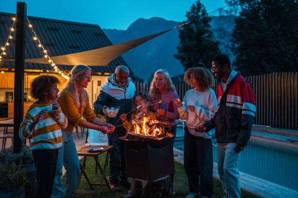 istock Multigenerational Family Roasting Marshmallows Outdoors 2148478612