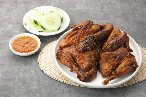 istock Ayam Bakar, roasted chicken with herbs and spice 2148478663