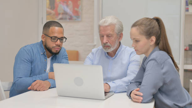 istock Multiracial Team Celebrating Success in Office 2148479859