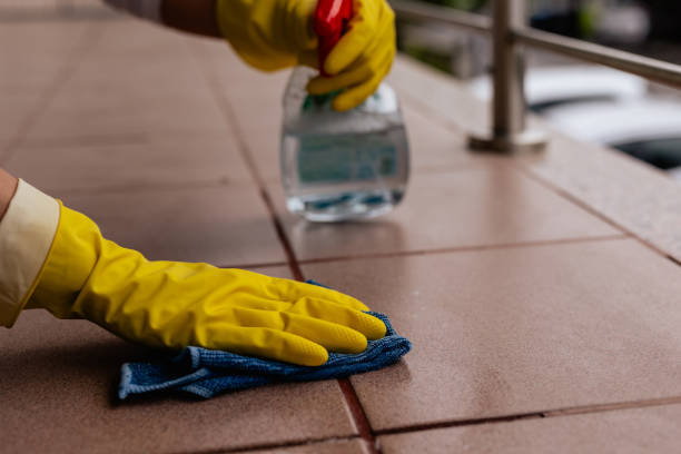 istock Woman cleaning tile floors outdoors, spring cleaning 2148480138