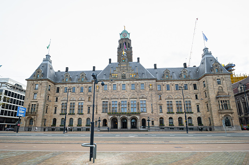 Rotterdam, Netherlands - April 2024: Wide angle view of the city hall at the Coolsingel in the city of Rotterdam.