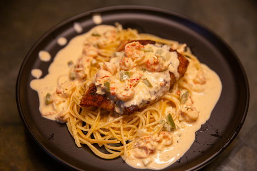 Blackened Snapper with Crawfish Pasta plated