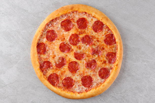 istock Appetizing Pepperoni Pizza, on a white background, isolate, for a food delivery site, 2148481785