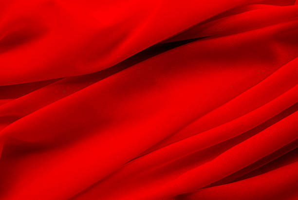 abstract blur or defocused red color cloth fabric motion background