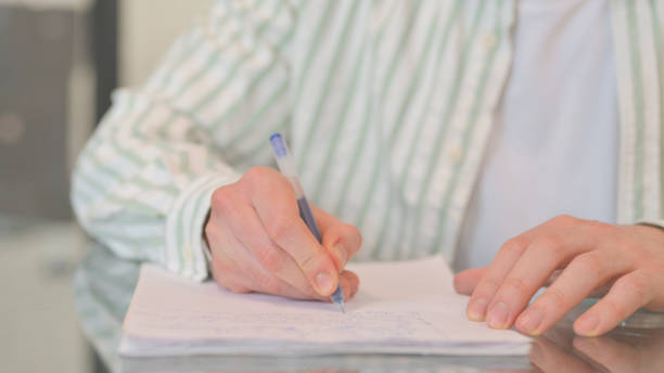 istock Close up of Man Writing a Letter 2148485907