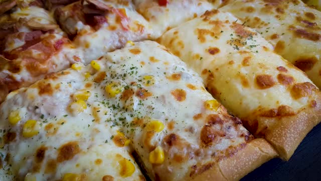 Amazing homemade square pizza with cheese and minced meat also sausage topping served on  wooden table Square pizza, full cheese spread  organic pizza  healthy pizza