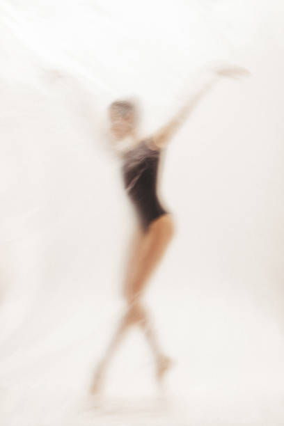 istock Beautiful ballerina dancing on the stage 2148489361