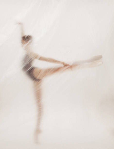 istock Beautiful ballerina dancing on the stage 2148489373