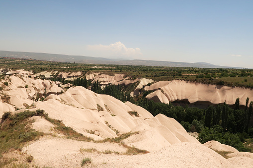 View into the Zemi valley with its dense forest, running parallel to Pigeon Valley, Güvercinlik Vadisi, Cappadocia, Turkey 2022