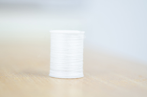 Color Yarn on brown table.