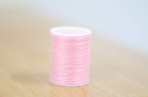 Color Yarn on brown table.