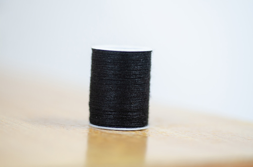 Color Yarn on brown table.