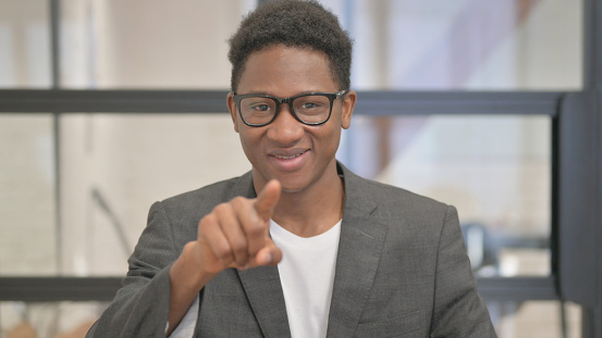 Portrait of African American Man Pointing at Camera