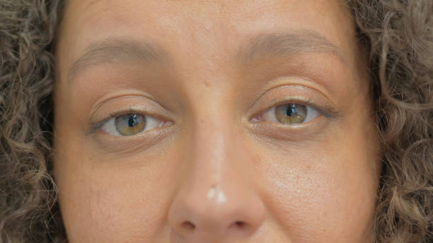 istock Close up of Female Blinking Eyes 2148494698