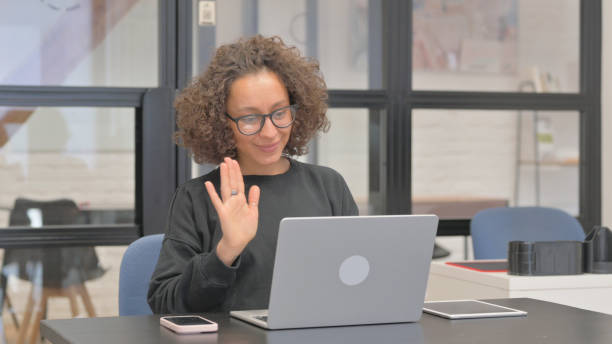 istock Mixed Race Woman Talking with Customer Online, Video Conference 2148495077