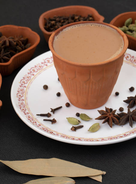 istock Indian Popular Drink Masala Chai or Masala on Black Background 2148495483