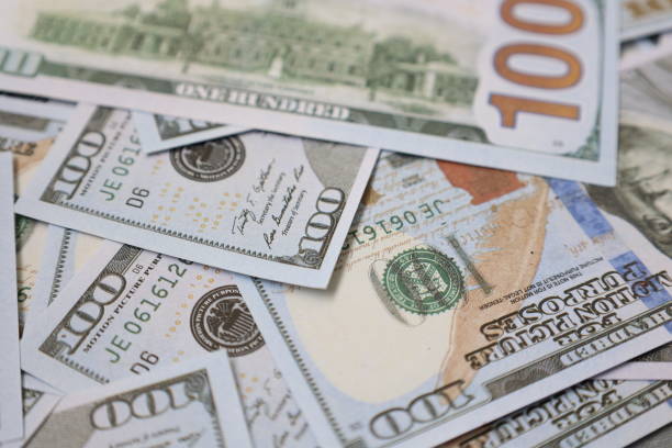 istock Money US dollar bills background 2148496411
