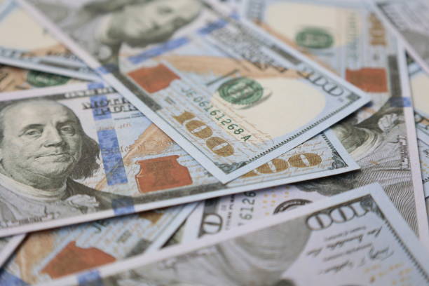 istock Money US dollar bills background 2148496435