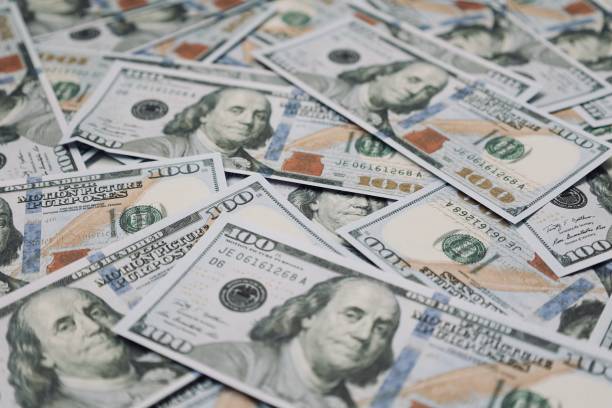 istock Money US dollar bills background 2148496477