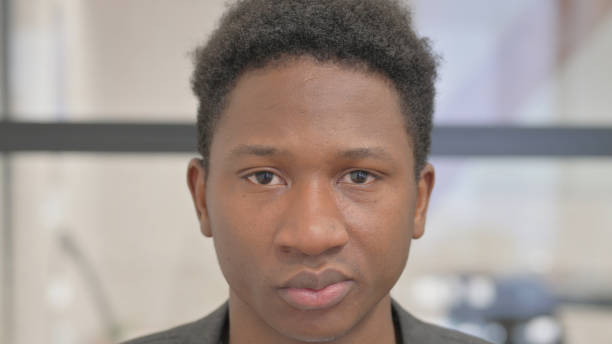 istock Close Up of Serious African Man Face 2148496717