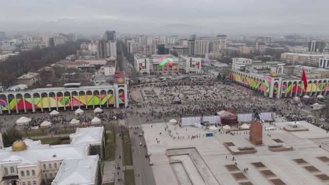 Aerial view of people celebrating Nowruz on central square of Bishkek city