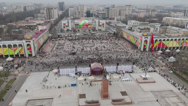 Aerial view of people celebrating Nowruz on central square of Bishkek city