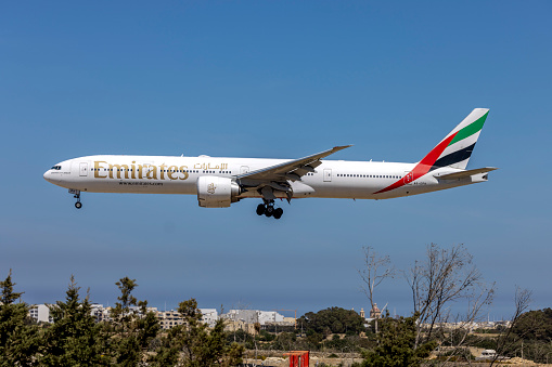 Luqa, Malta - April 6, 2024: Emirates Boeing 777-31H-ER (REG: A6-EPH) on finals runway 31.