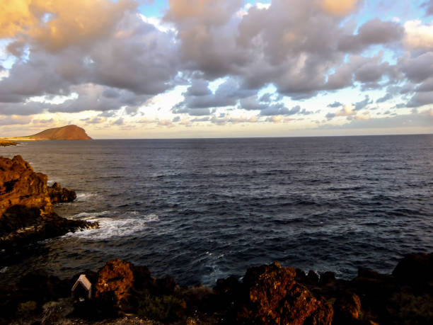 sunrise over the sea from top of volcano on La Graciosa