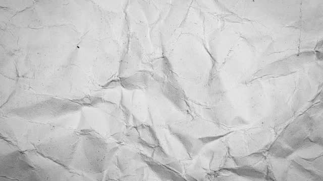 Stop motion animated paper texture background. Crumpled White Paper Looping Animation in 4k