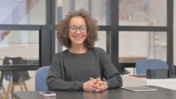 istock Mixed Race Woman Smiling at Camera 2148499865