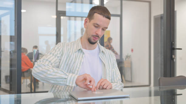 istock Creative Young Man Coming Office in Morning 2148500416