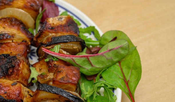 istock Grilled meat skewers lie on a plate 2148502017