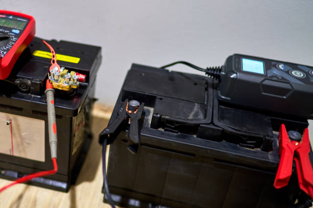 istock car battery is charged by the device 2148502911