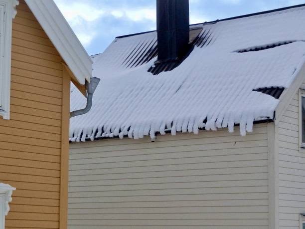 istock Snow falls off Tromso roof in sheets 2148505562