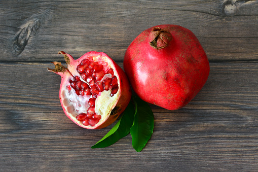 Pieces of pomegranate on white background.